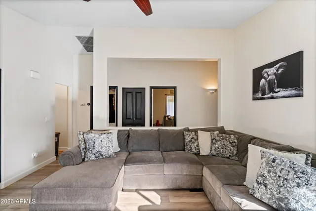 a living room with furniture and a couch