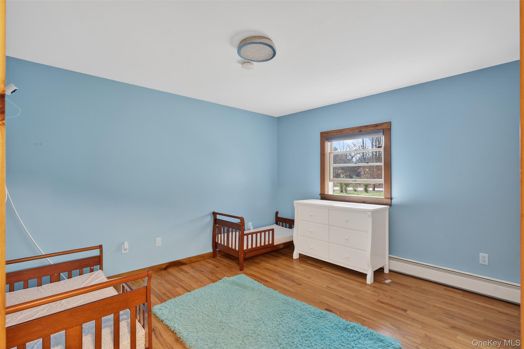 158 Wade Road Liberty, NY 12754 - Photo 18 of 34 a view of an empty room and wooden floor
