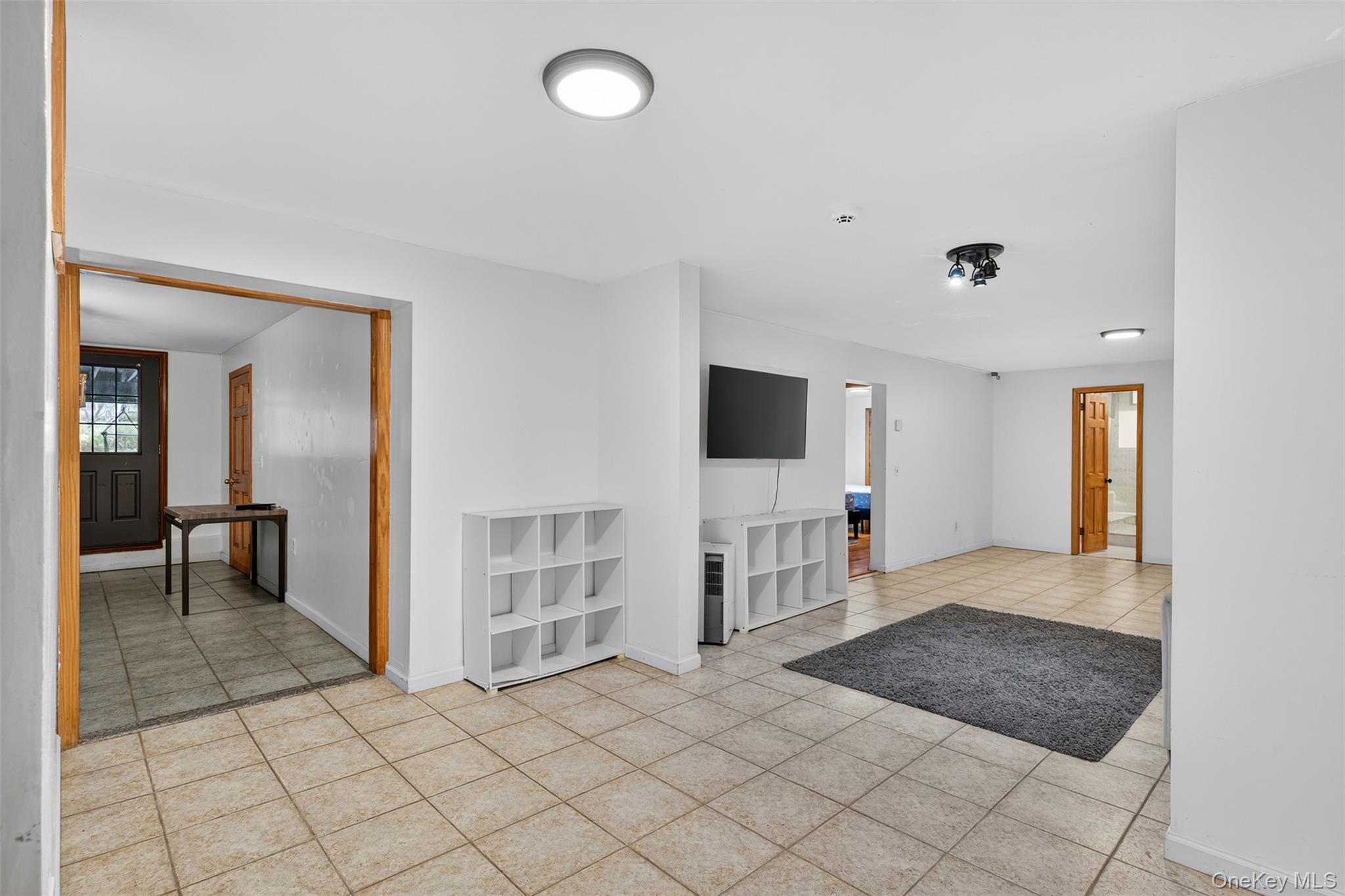 158 Wade Road Liberty, NY 12754 - Photo 20 of 34 a view of a livingroom with wooden floor and a flat screen tv