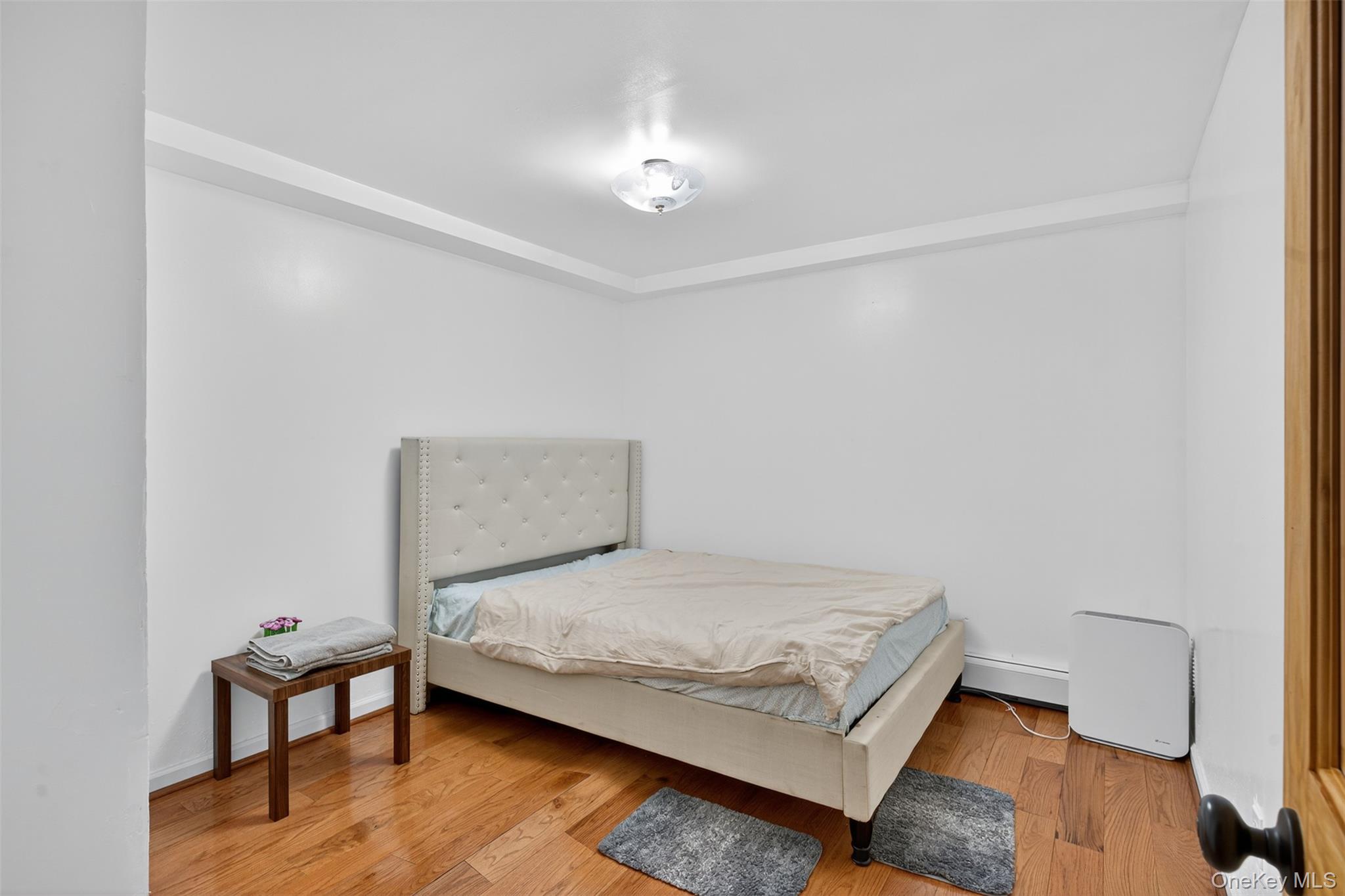 158 Wade Road Liberty, NY 12754 - Photo 21 of 34 a bedroom with a bed table and chair