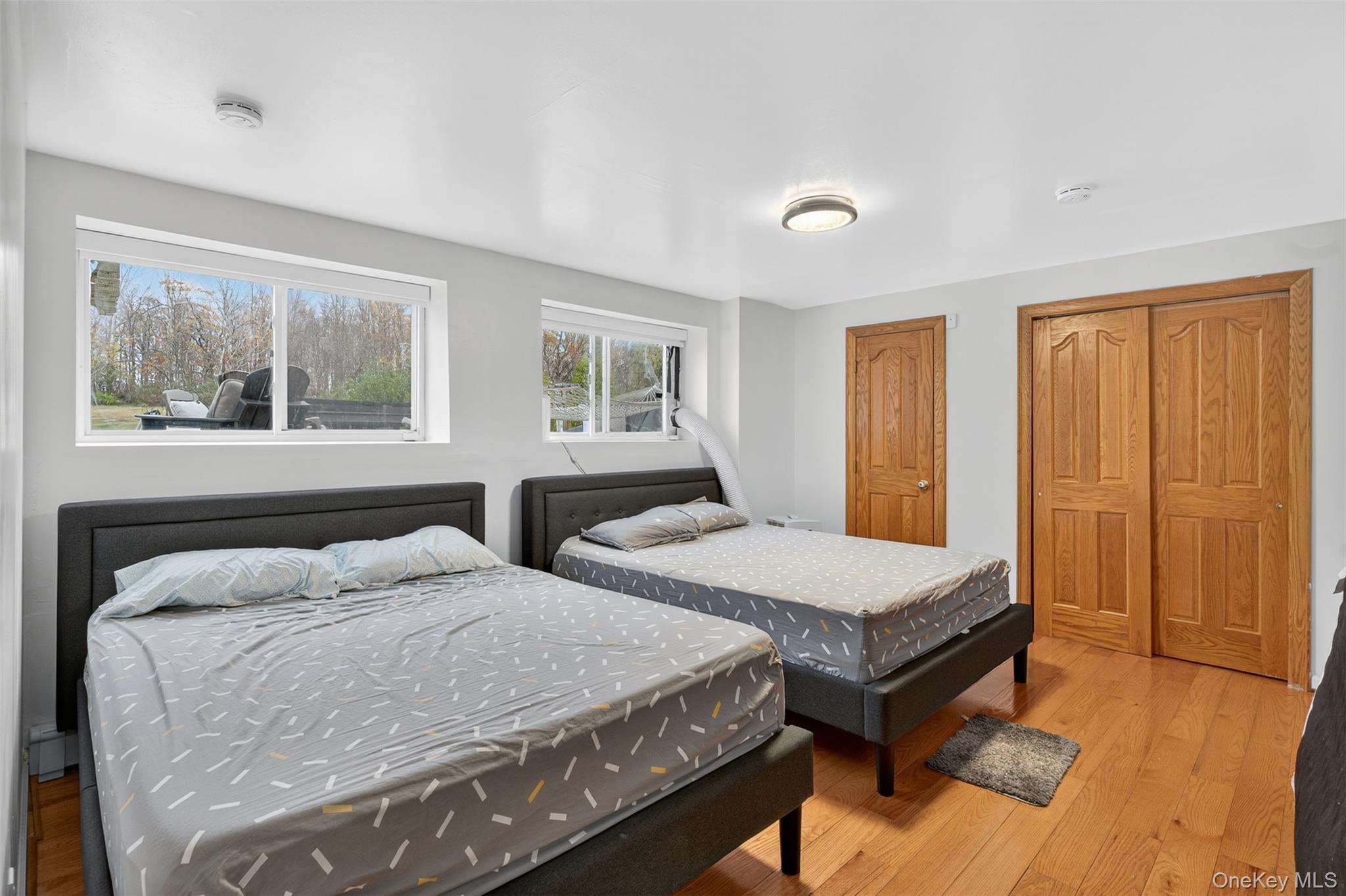 158 Wade Road Liberty, NY 12754 - Photo 23 of 34 a bedroom with two beds and a window