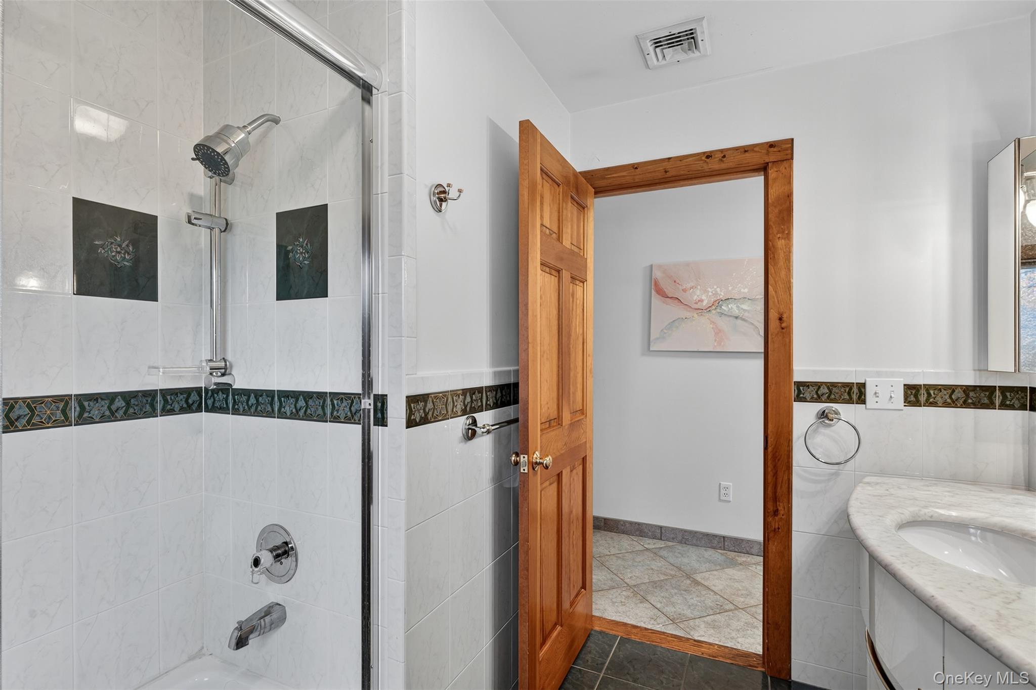 158 Wade Road Liberty, NY 12754 - Photo 24 of 34 a bathroom with a tub a mirror and a shower