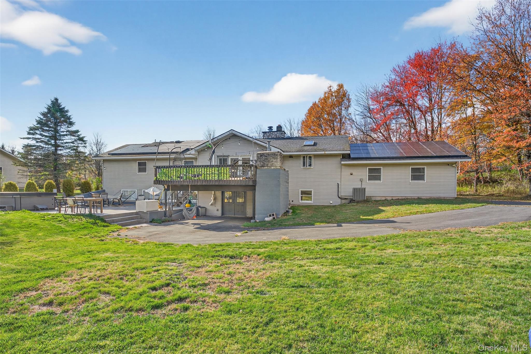 158 Wade Road Liberty, NY 12754 - Photo 28 of 34 a view of a house with swimming pool and a yard