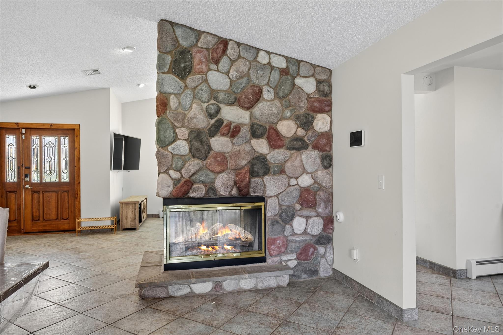 158 Wade Road Liberty, NY 12754 - Photo 6 of 34 a living room with a fireplace