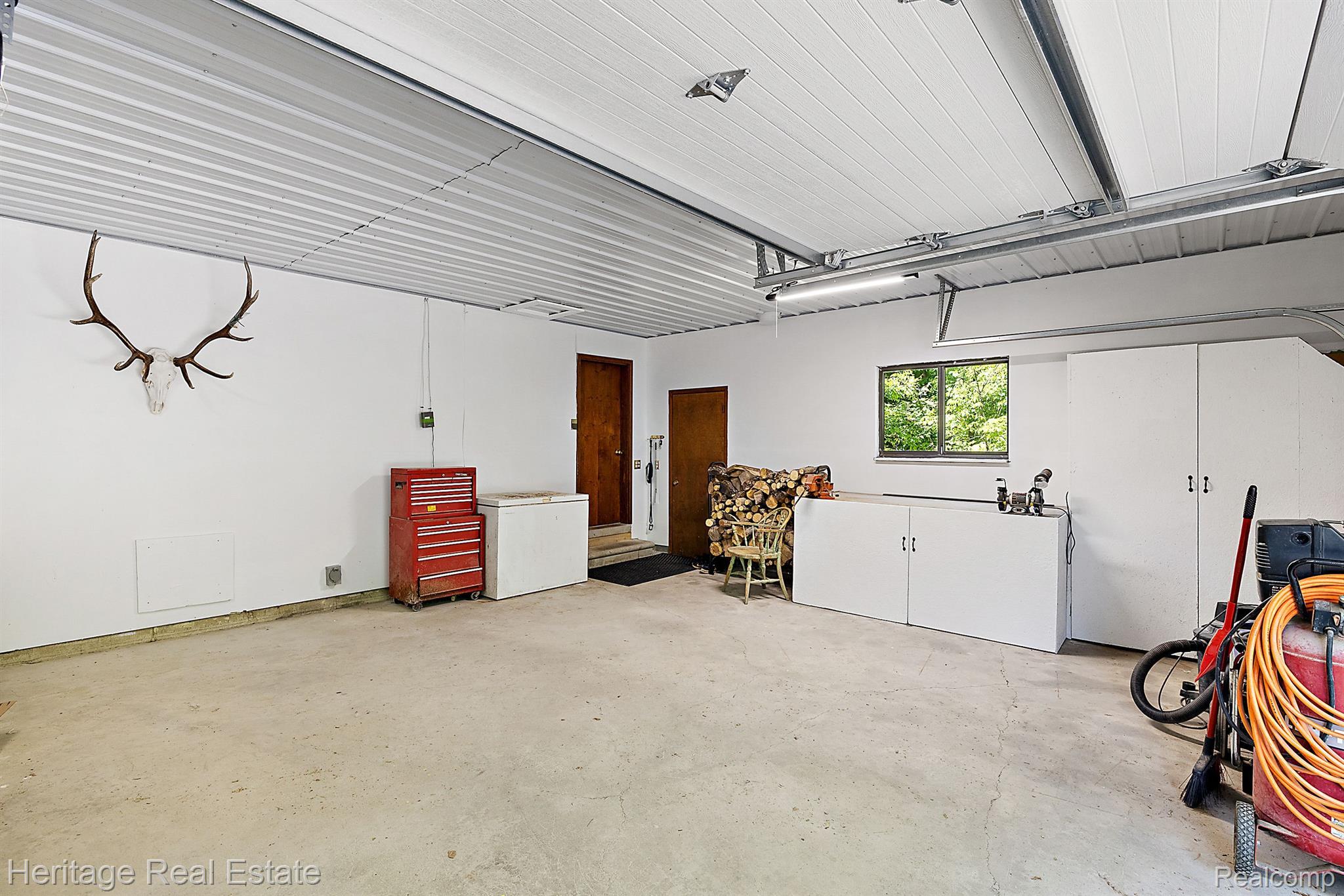 3190 West Brocker Road Metamora, MI 48455 - Photo 64 of 75 3 car attached garage