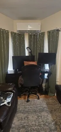 a room with furniture and a window