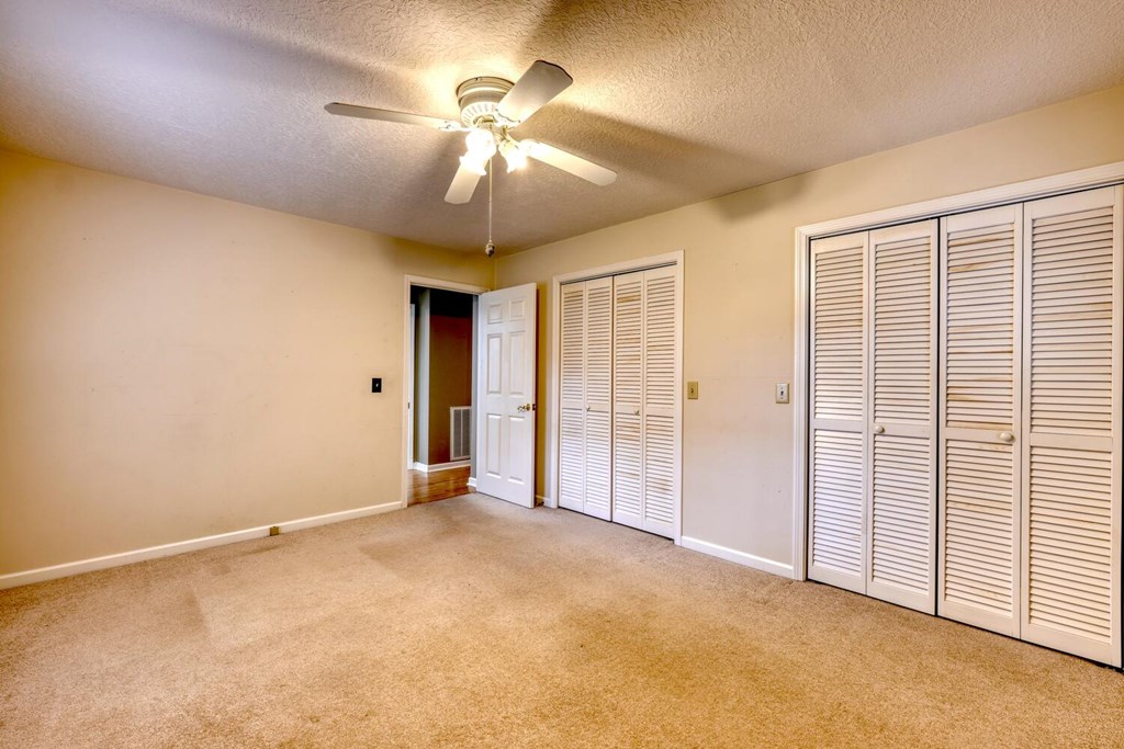 241 12 Point Road Blairsville, GA 30512 - Photo 22 of 34 an empty room with chandelier fan