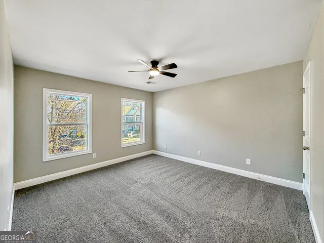 a bathroom with a toilet a sink and bathtub