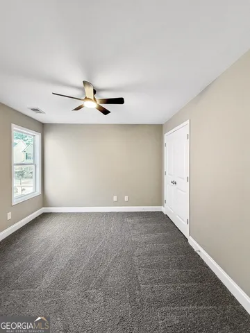 a view of a yard in front of a house