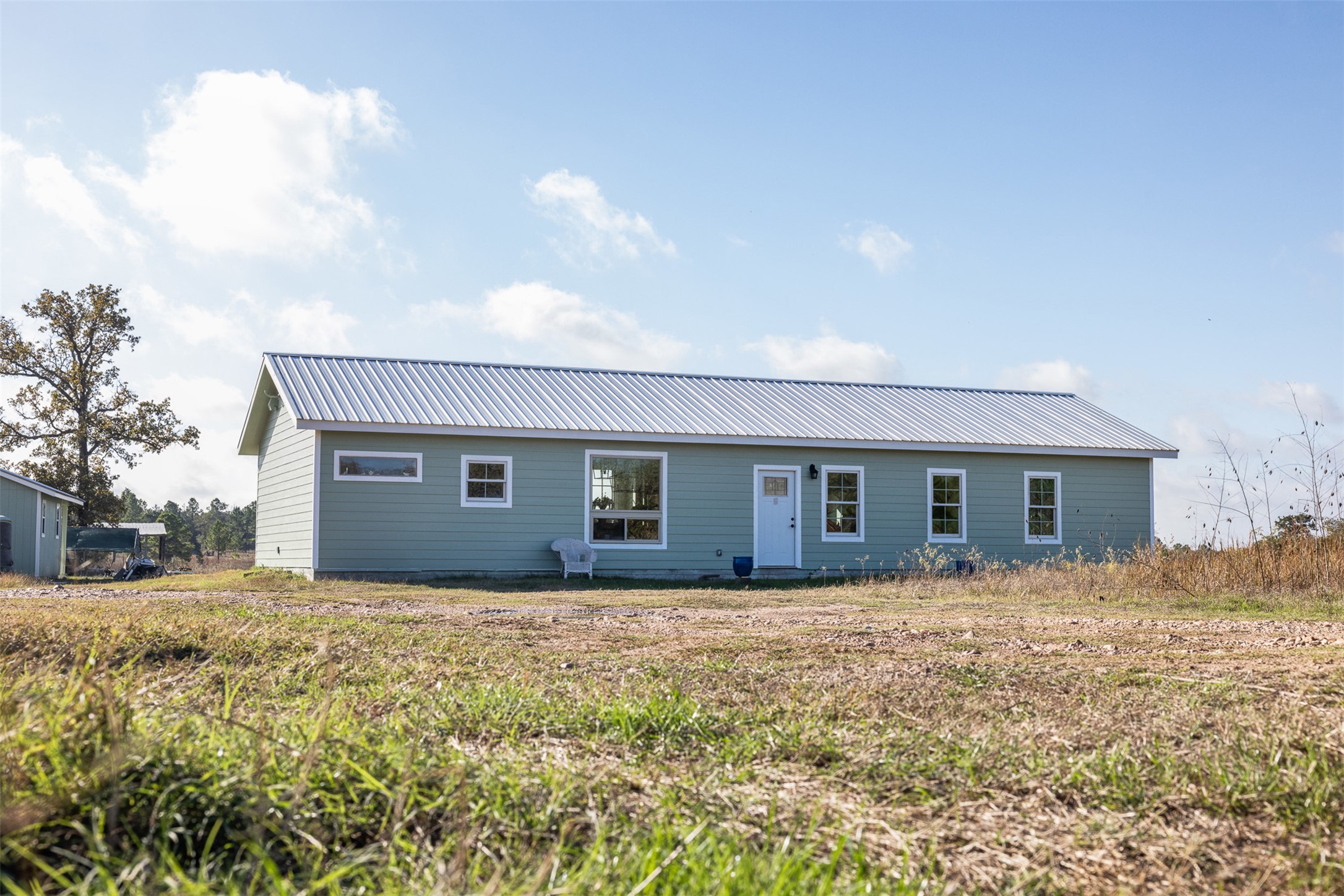 1759 Gotier Trace Road Paige, TX 78659 - Photo 26 of 40 a house with yard in front of it