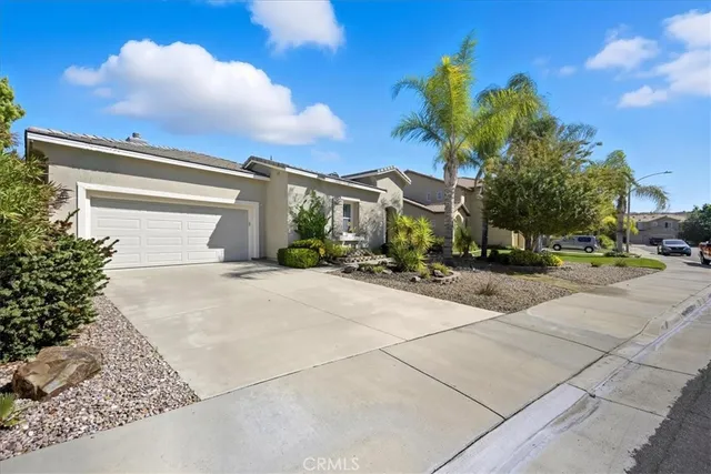 a view of a street with a building in the background