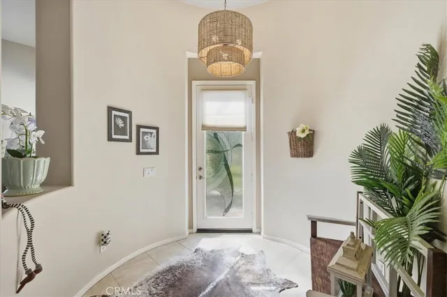 a view of a bedroom with a potted plant