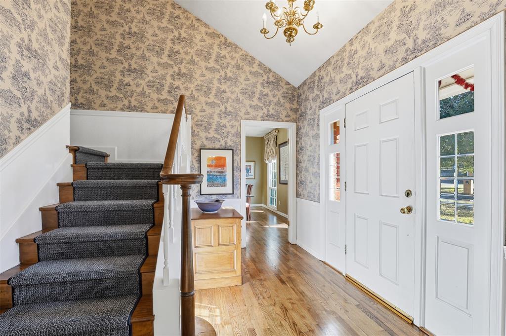 3800 Hollow Creek Road Benbrook, TX 76116 - Photo 4 of 29 a view of an entryway with wooden floor and workspace