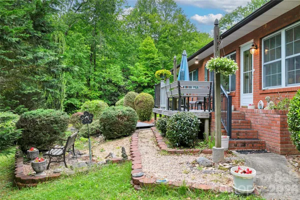 front view of a house with a garden