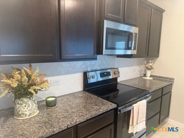 a kitchen with a sink and a cabinets