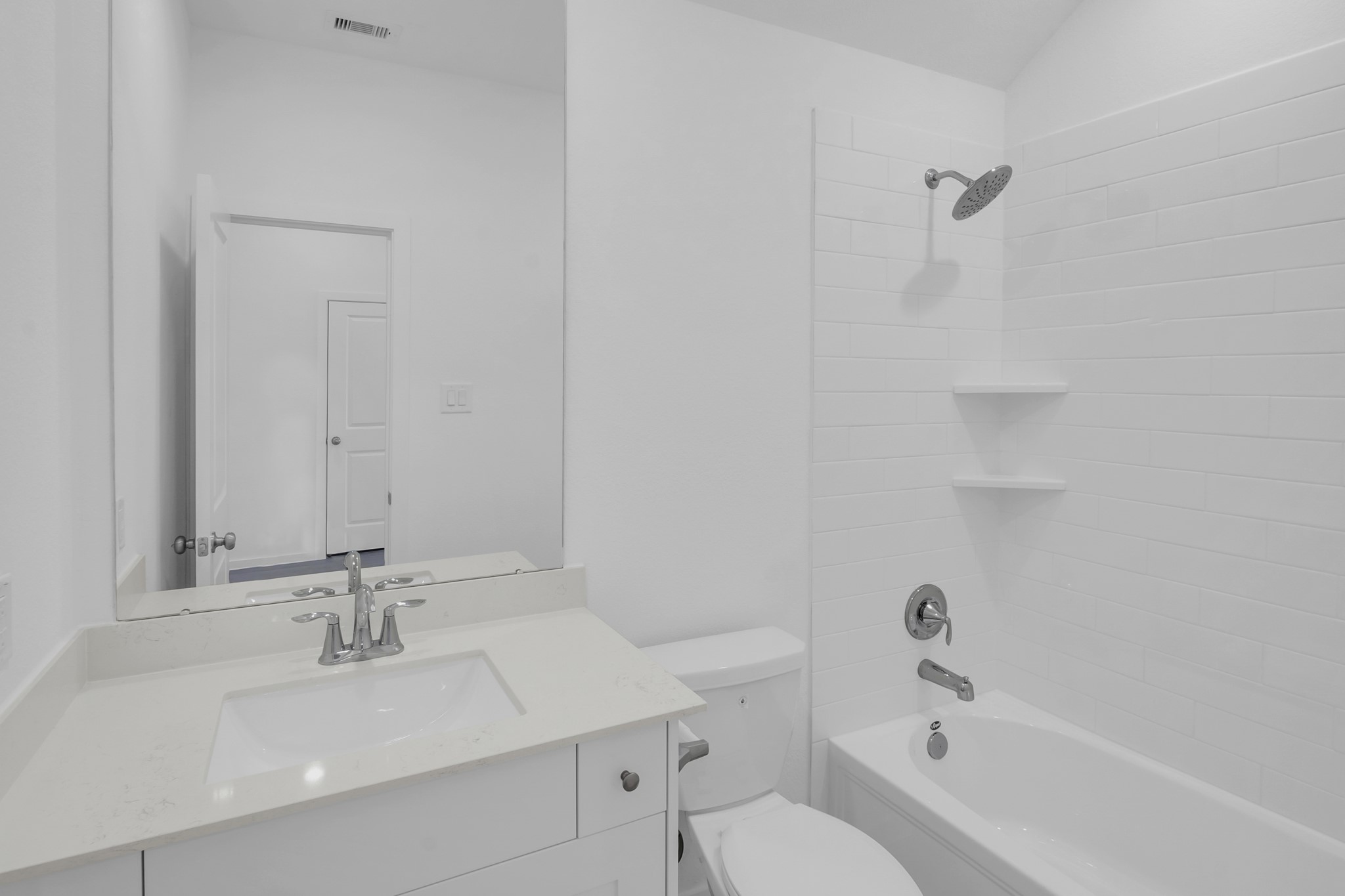 2135 Mosaic Vly Court Angleton, TX 77515 - Photo 13 of 15 a bathroom with a sink and a bathtub