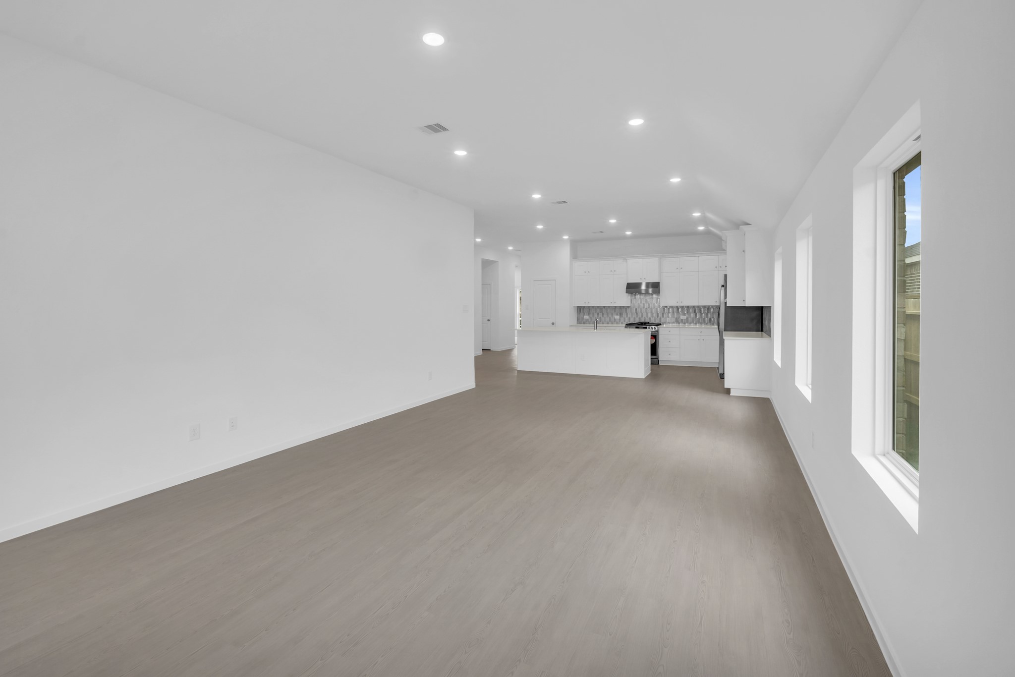 2135 Mosaic Vly Court Angleton, TX 77515 - Photo 6 of 15 a view of a kitchen with a sink and cabinets