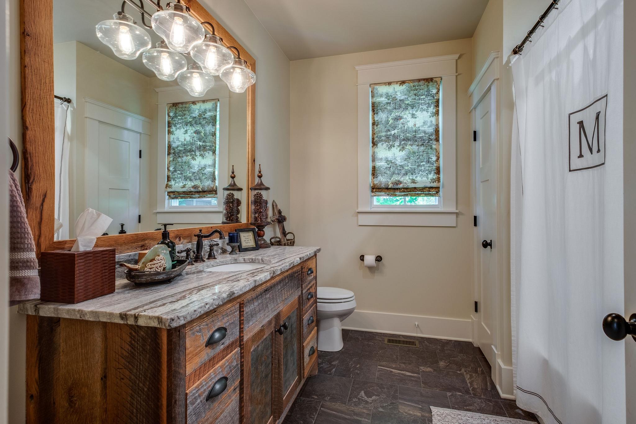 1036 Ridglea Drive Burns, TN 37029 - Photo 13 of 28 4 Full Bathrooms w/ Tile & Luxury Finishes (Custom Commissioned Vanities)