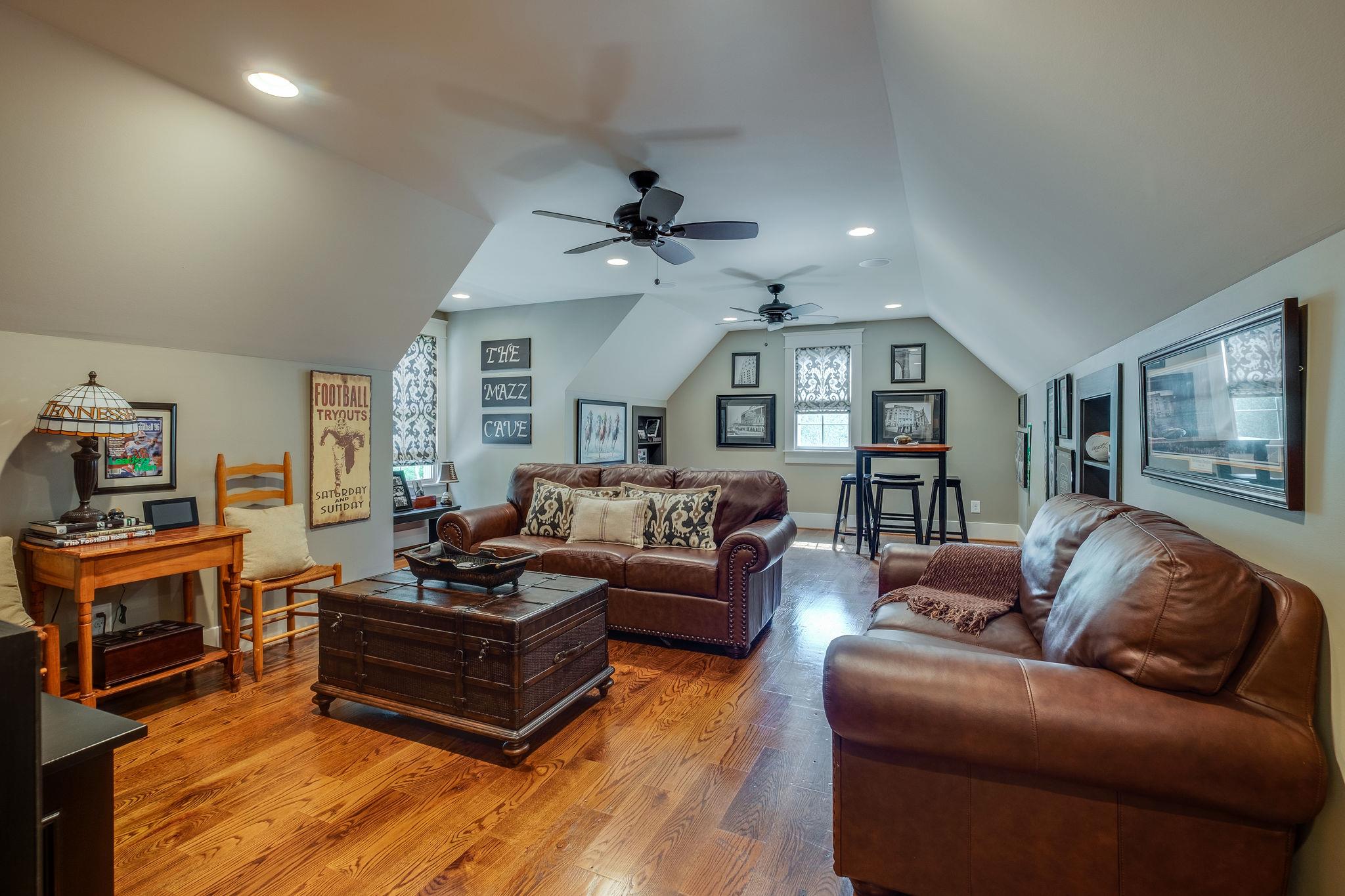1036 Ridglea Drive Burns, TN 37029 - Photo 17 of 28 Media Room w/ Wet Bar and All Hardwood Floors