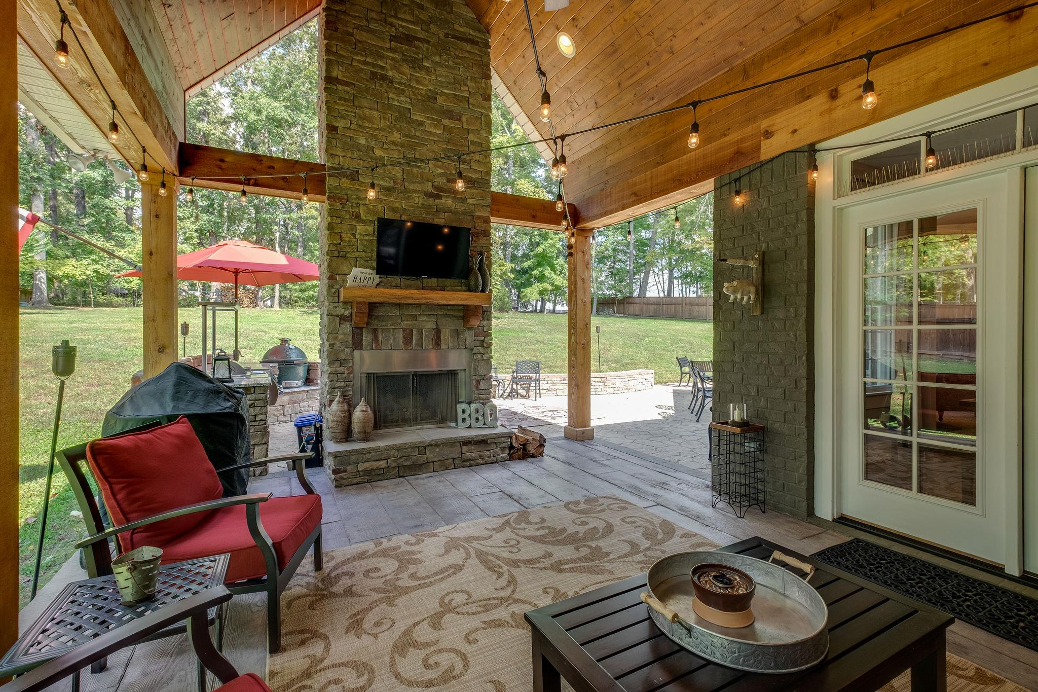 MADE FOR ENTERTAINING! 2 Story Stone Fireplace on the Covered Patio