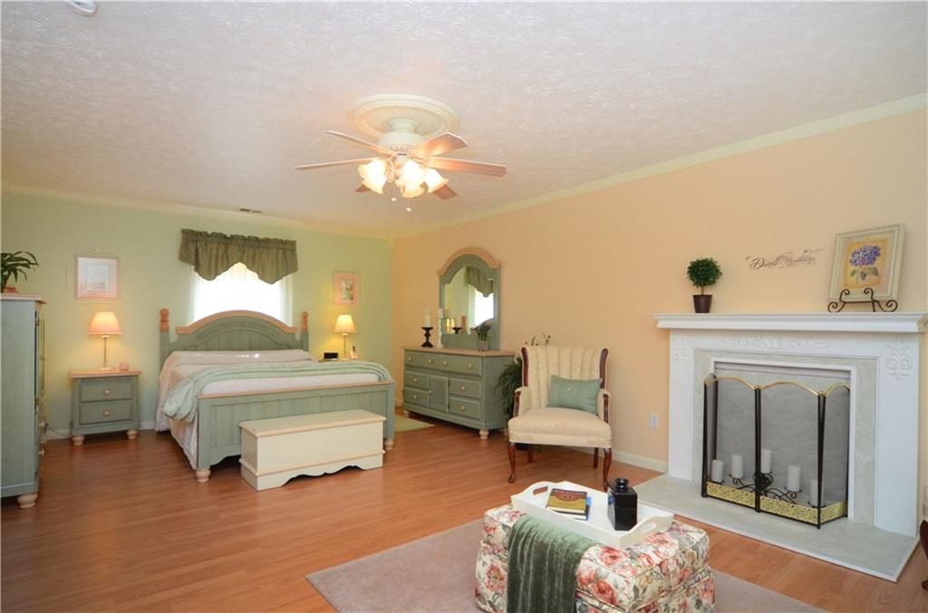 2209 North Forest Grove Road Coraopolis, PA 15108 - Photo 15 of 25 Huge potential master bedroom on the second level is 24x14. Faux fireplace, large walk-in closet and sitting area. Flooring is laminate.