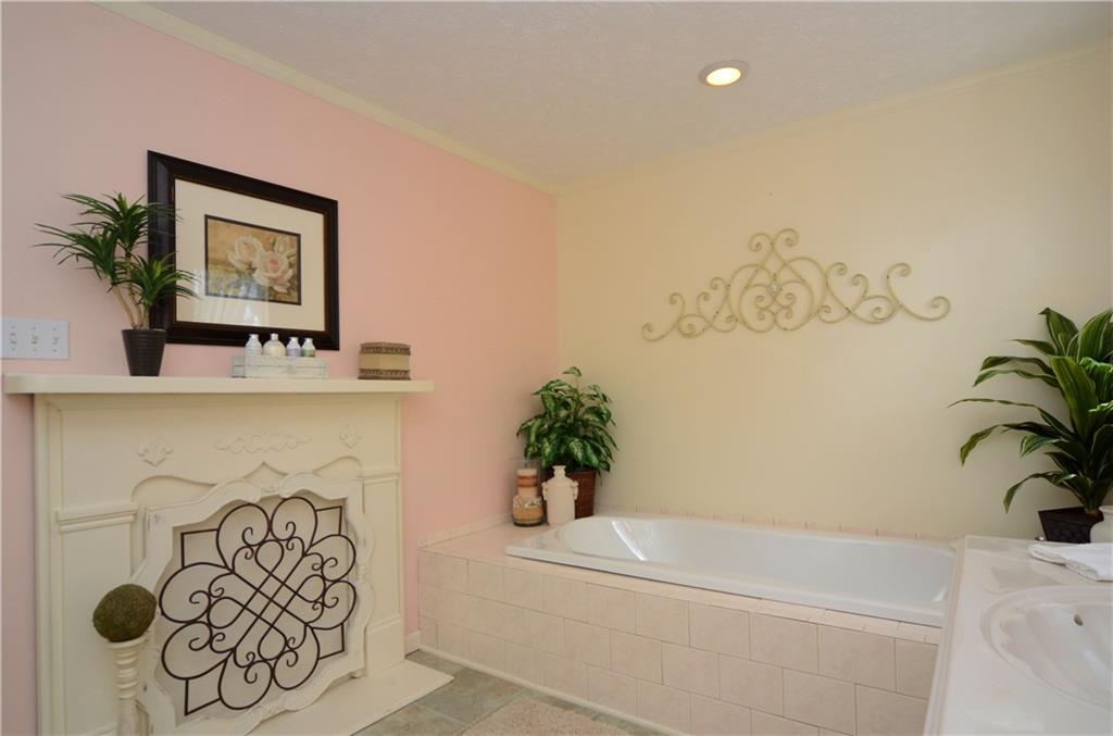 2209 North Forest Grove Road Coraopolis, PA 15108 - Photo 17 of 25 Second floor full bath features a jet spray tub, faux fireplace and plenty of room 13x9.