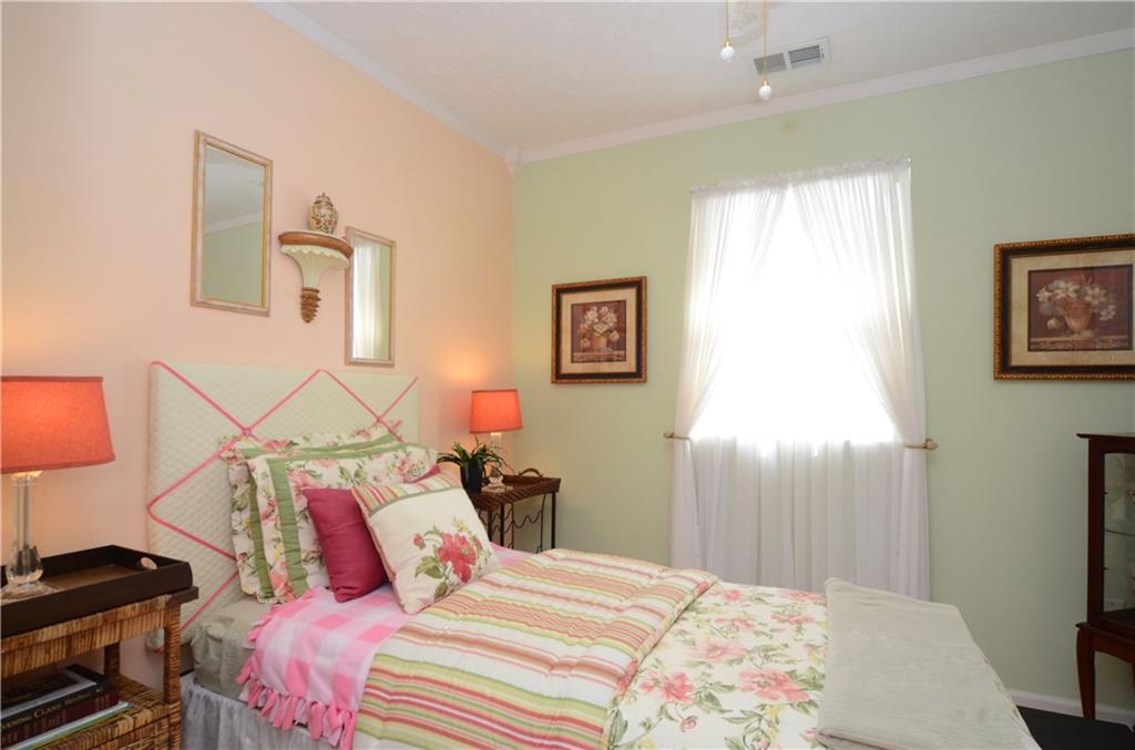 2209 North Forest Grove Road Coraopolis, PA 15108 - Photo 19 of 25 Bedroom #4 also features a lighted double closet, ceiling fan, crown molding and laminate flooring.