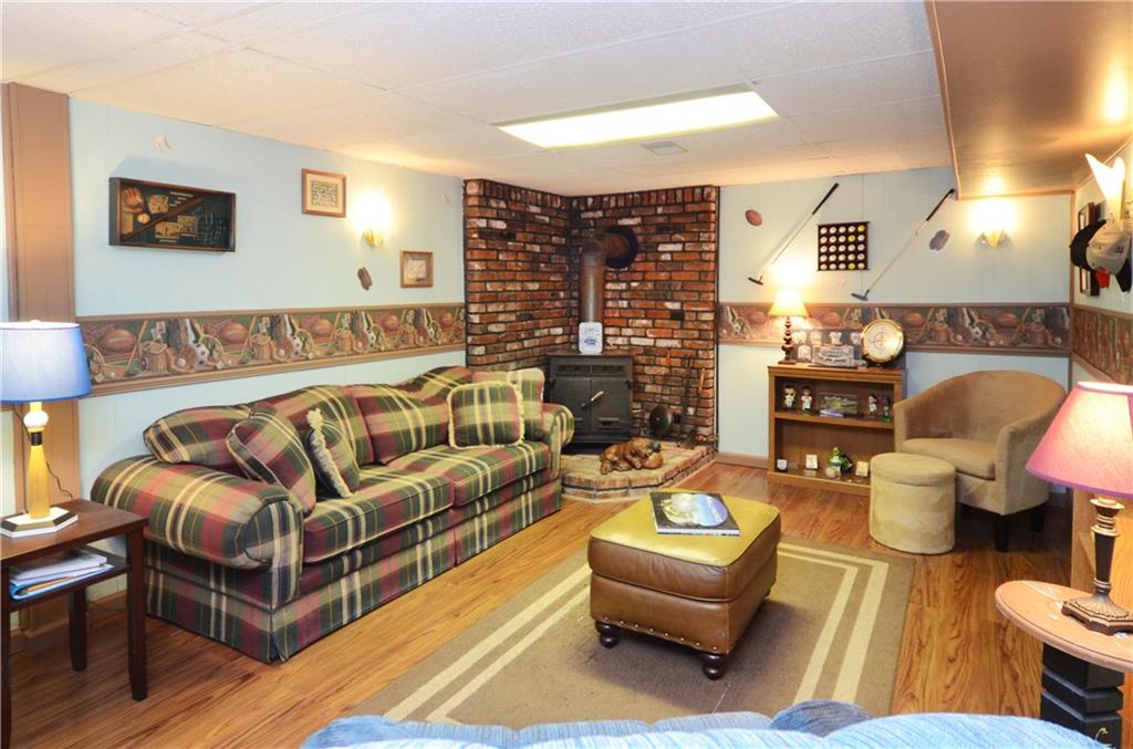 2209 North Forest Grove Road Coraopolis, PA 15108 - Photo 20 of 25 Finished lower level has laminate flooring, plenty of storage and a full bath.