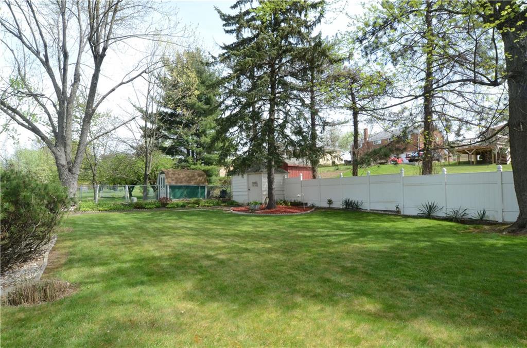 2209 North Forest Grove Road Coraopolis, PA 15108 - Photo 22 of 25 Upper tier of the yard has a privacy fence along the back and in the distance is a 10x10 shed with electricity and a sink. Plumbing repairs required for it to be operational again but there is a water line connected.