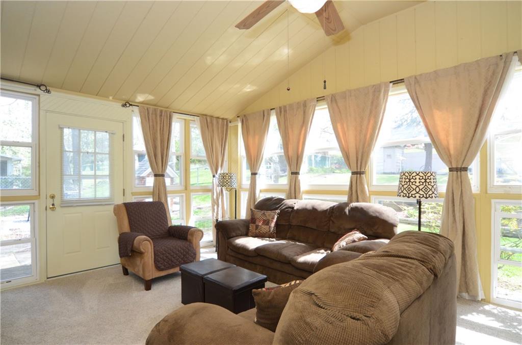 2209 North Forest Grove Road Coraopolis, PA 15108 - Photo 9 of 25 4 Season Room has brand new wall to wall carpeting. Vaulted ceiling with lighted fan. Includes a vent-less gas stove for the winter months and a separate A/C unit for the summer.