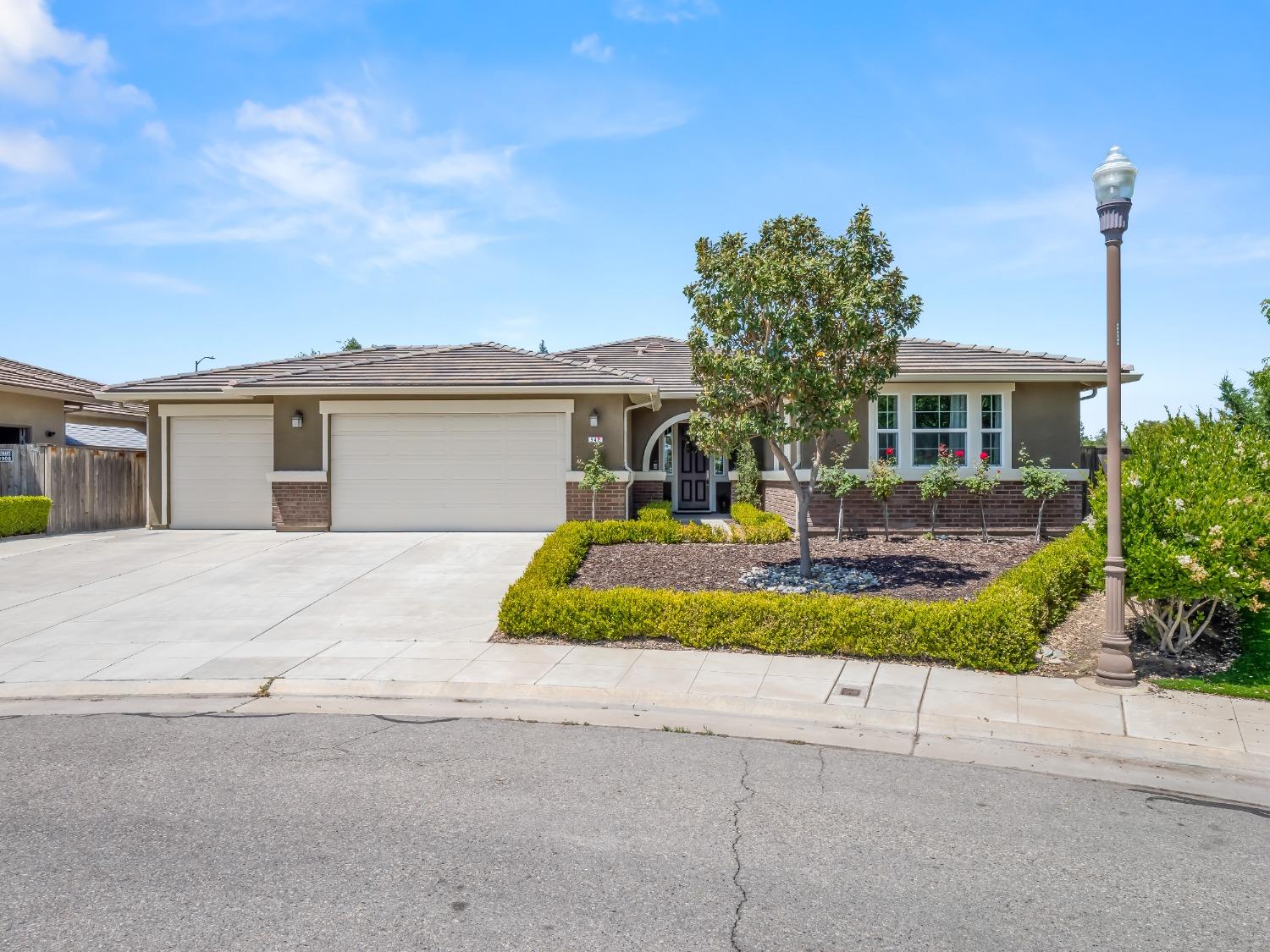 948 Whitmore Avenue Clovis, CA 93619 - Photo 1 of 38 front view of house with a yard