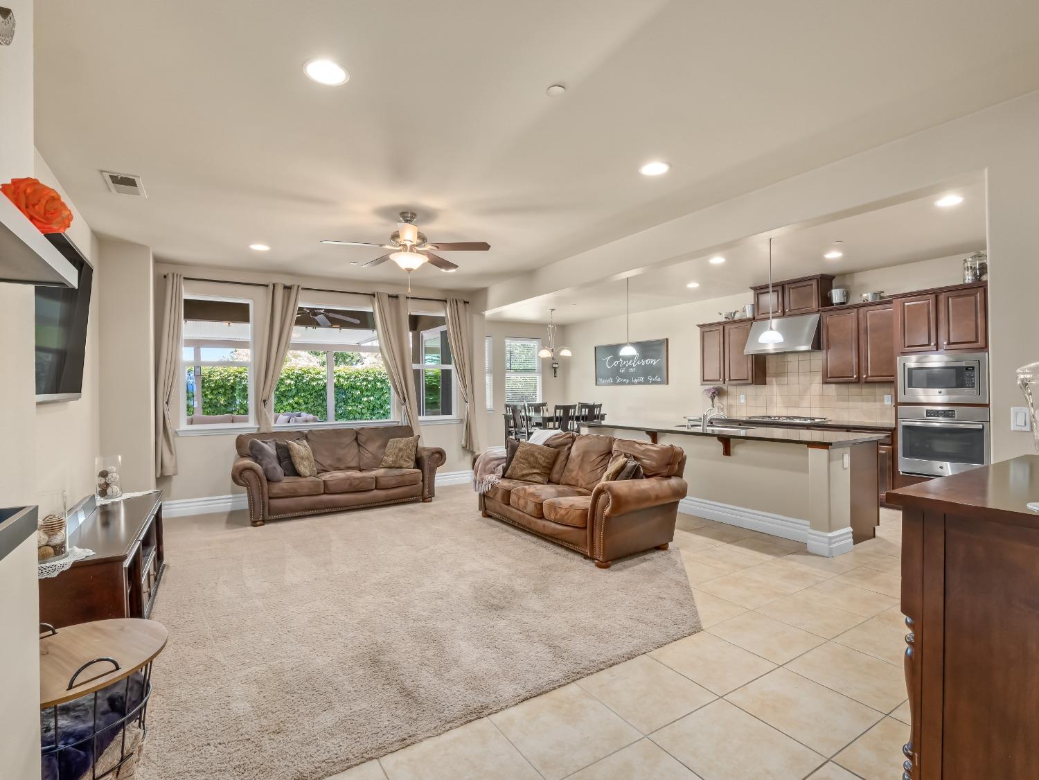 948 Whitmore Avenue Clovis, CA 93619 - Photo 3 of 38 a living room with furniture and a large window