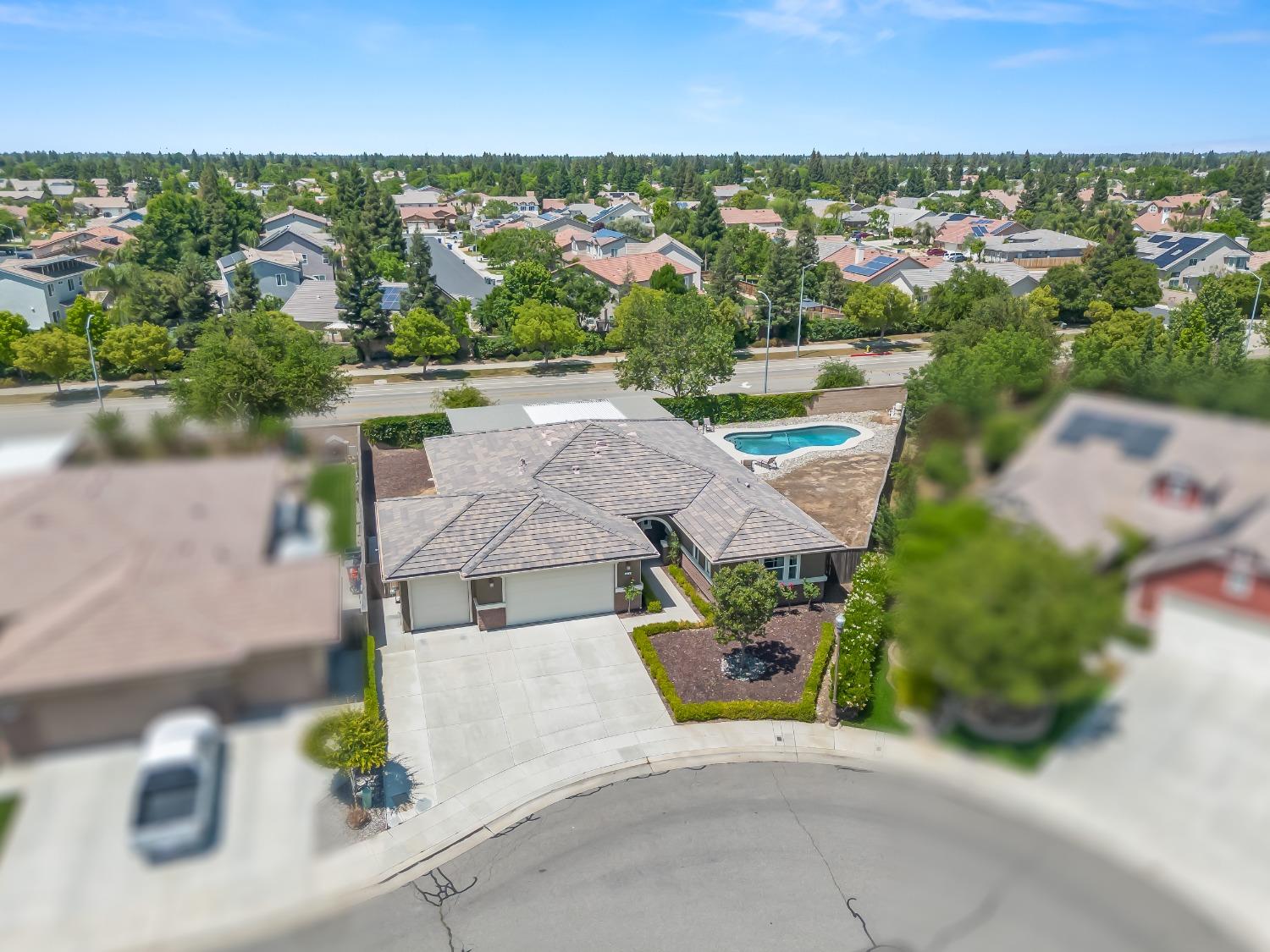 948 Whitmore Avenue Clovis, CA 93619 - Photo 38 of 38 an aerial view of a house with a garden