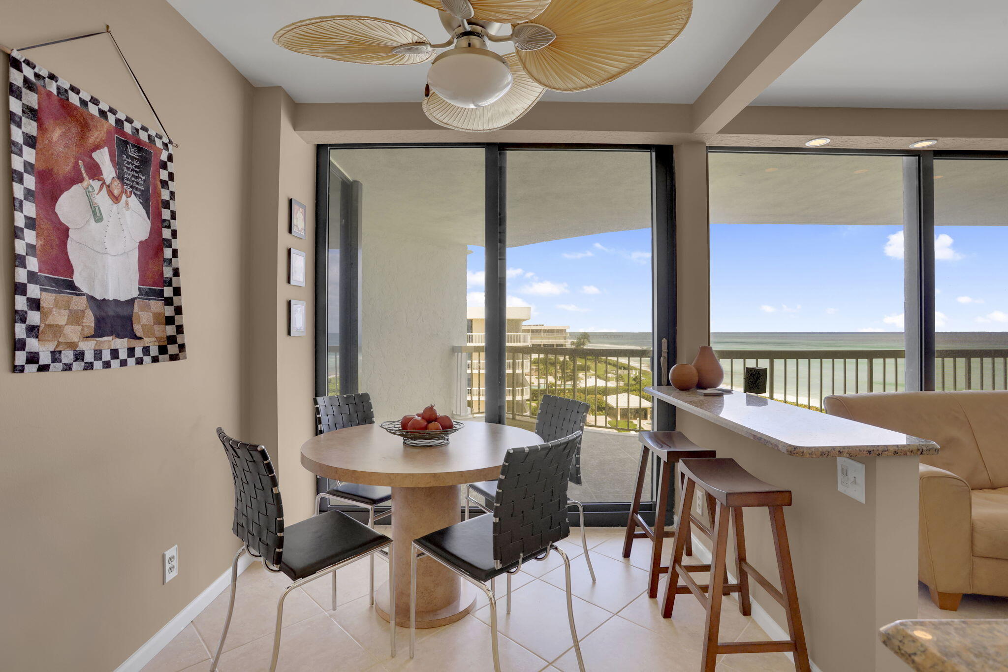 3300 South Ocean Boulevard, Unit 504S Palm Beach, FL 33480 - Photo 15 of 24 a view of a dining room with furniture window and outside view