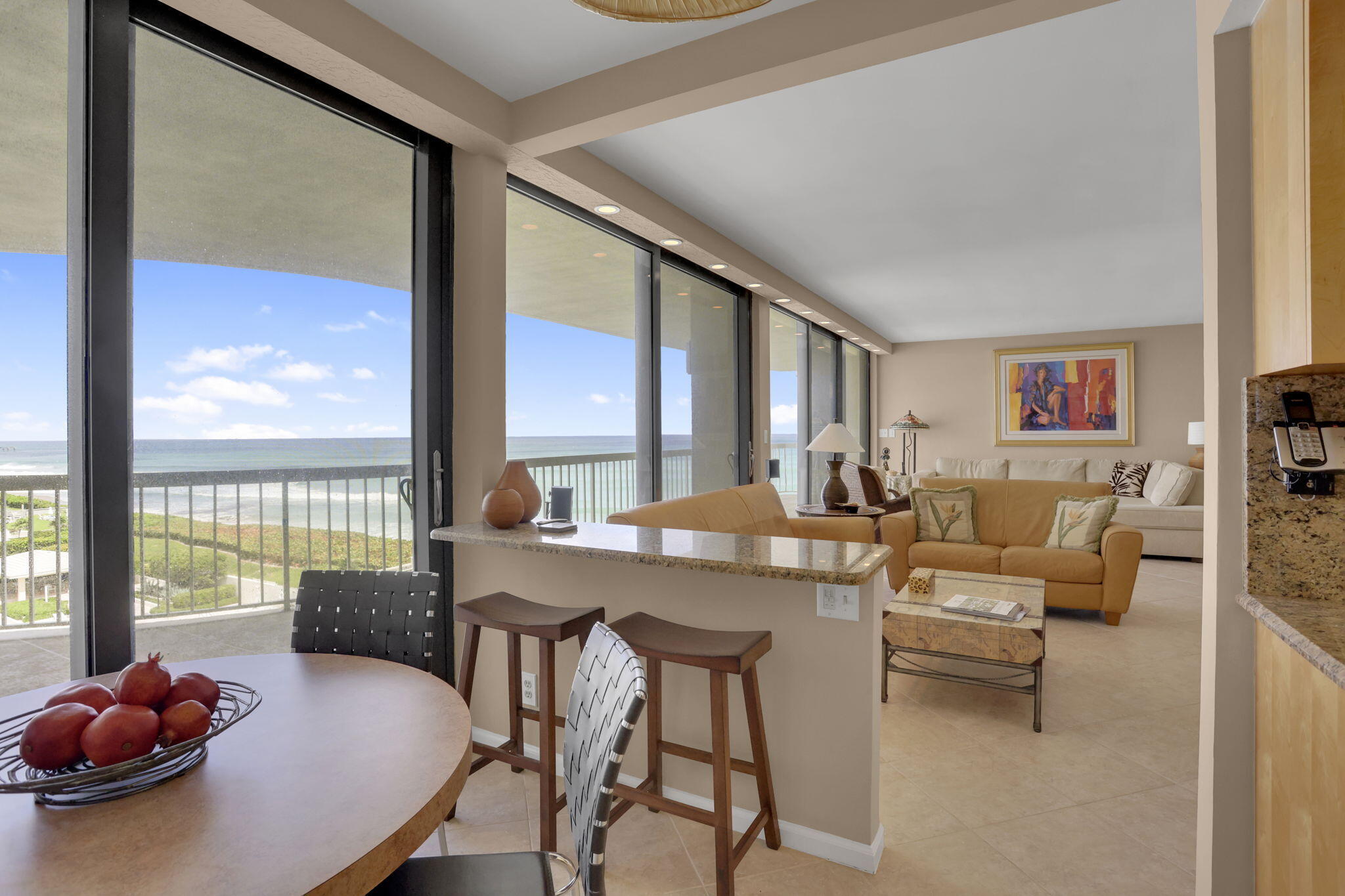 3300 South Ocean Boulevard, Unit 504S Palm Beach, FL 33480 - Photo 16 of 24 a view of a dining room with furniture and a large window