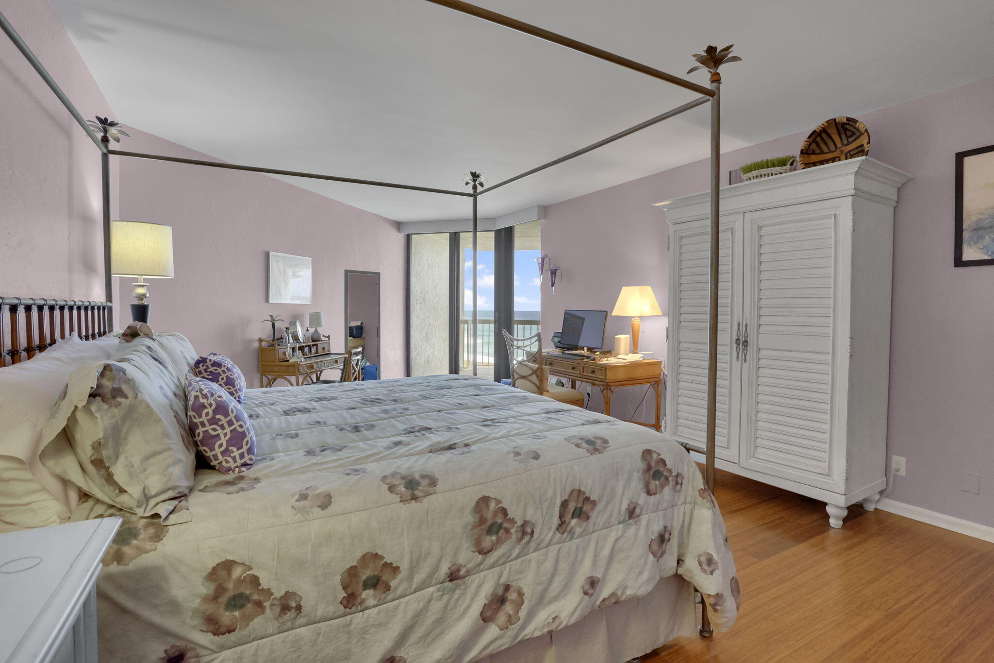 3300 South Ocean Boulevard, Unit 504S Palm Beach, FL 33480 - Photo 19 of 24 a bed room with a bed and a mirror