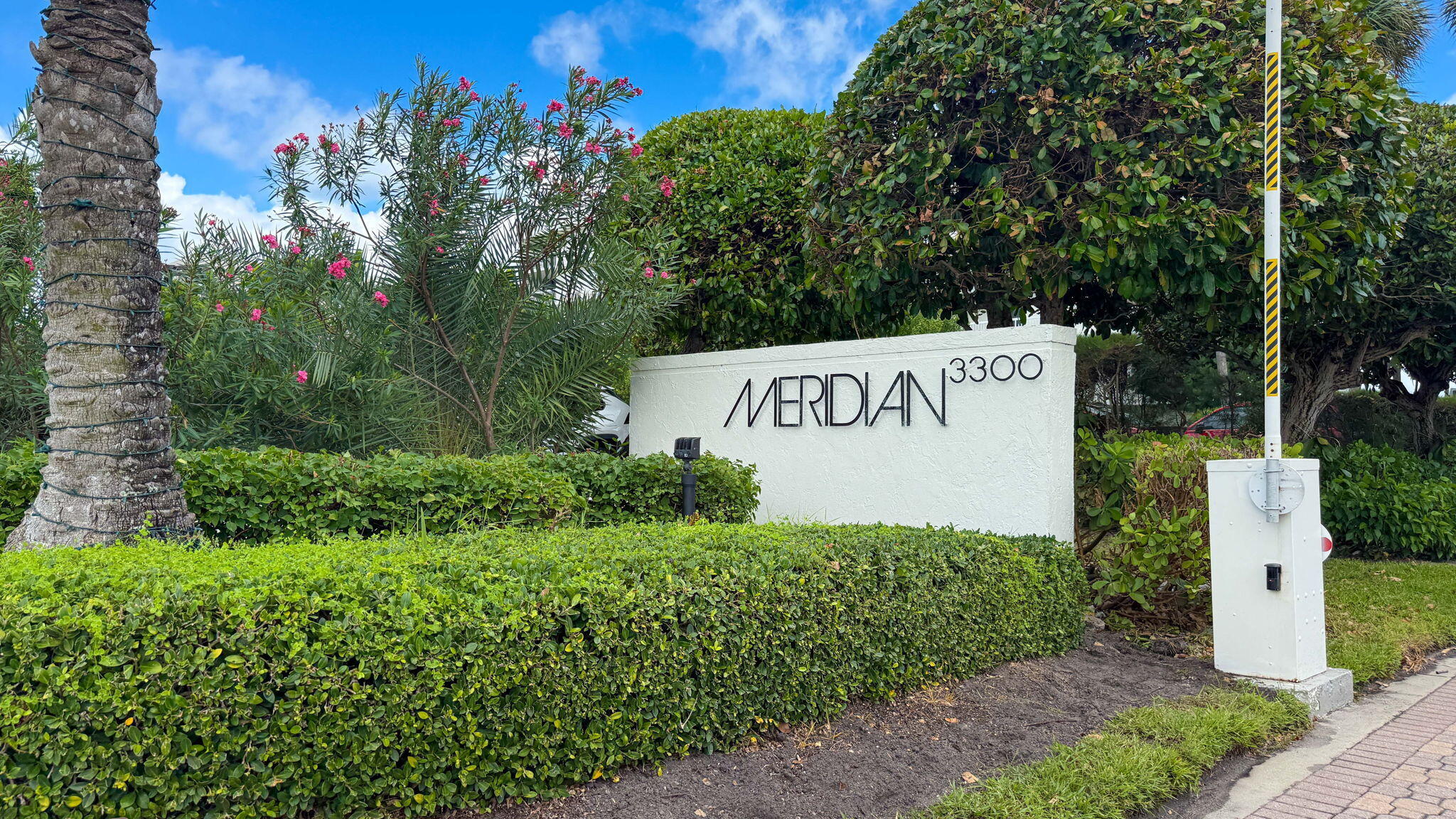 3300 South Ocean Boulevard, Unit 504S Palm Beach, FL 33480 - Photo 6 of 24 a sign on the side of the road