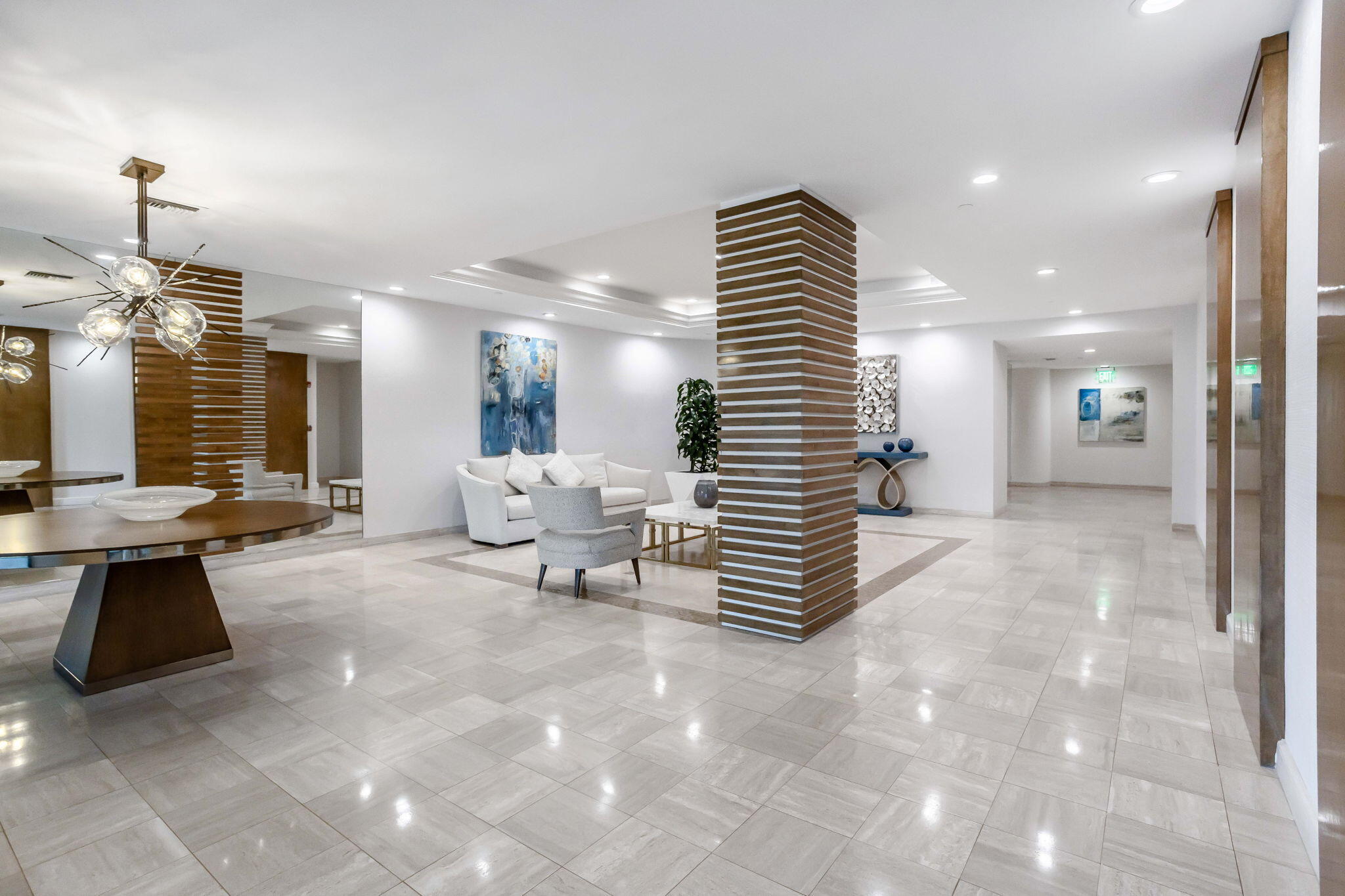 3300 South Ocean Boulevard, Unit 504S Palm Beach, FL 33480 - Photo 7 of 24 a lobby with furniture and stairs