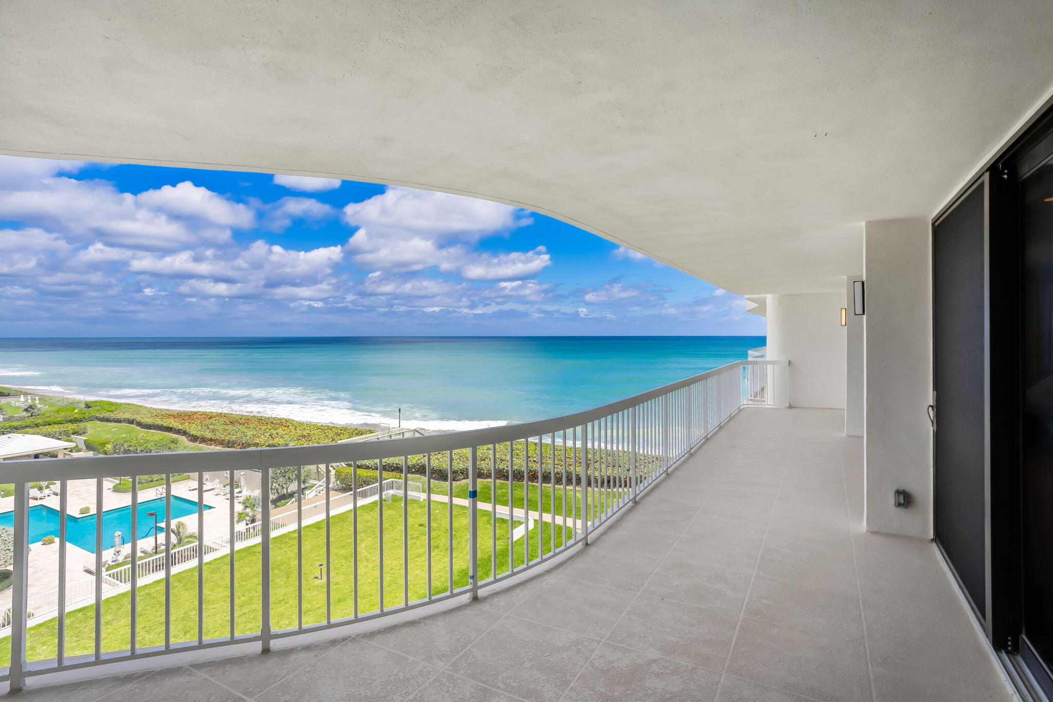 3300 South Ocean Boulevard, Unit 504S Palm Beach, FL 33480 - Photo 10 of 24 a view of a swimming pool and an outdoor seating