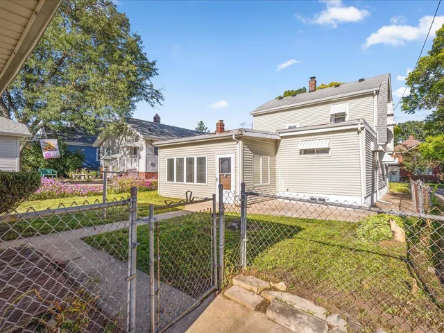 a view of a back yard of the house