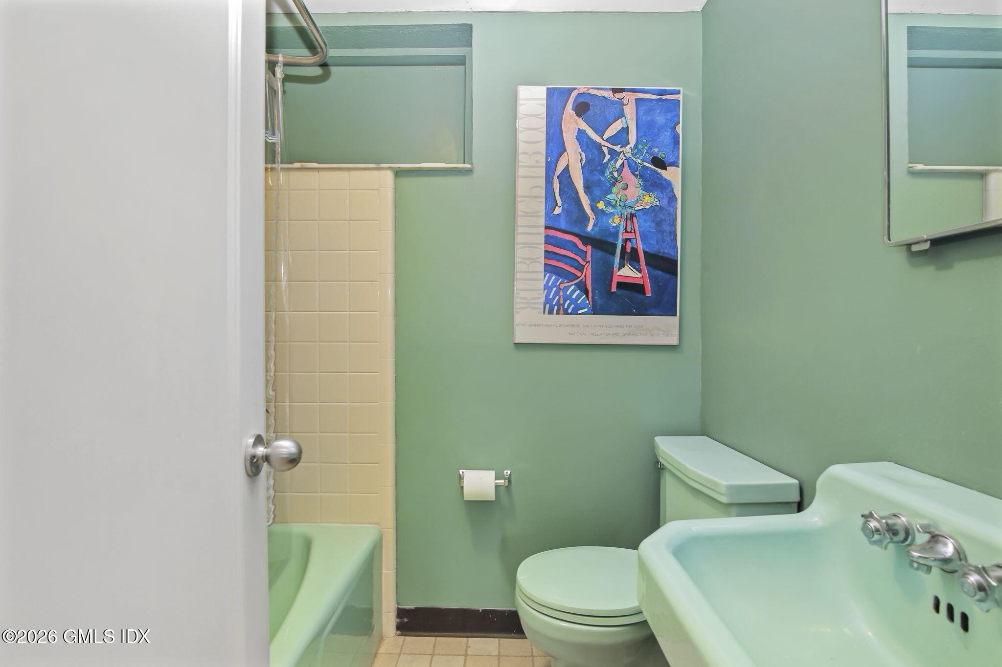 185 Valley Road Cos Cob, CT 06807 - Photo 30 of 38 a white toilet sitting next to a bathroom sink