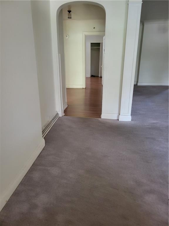 5557 Beacon Street Pittsburgh, PA 15217 - Photo 6 of 14 a view of a hallway with wooden floor and entryway