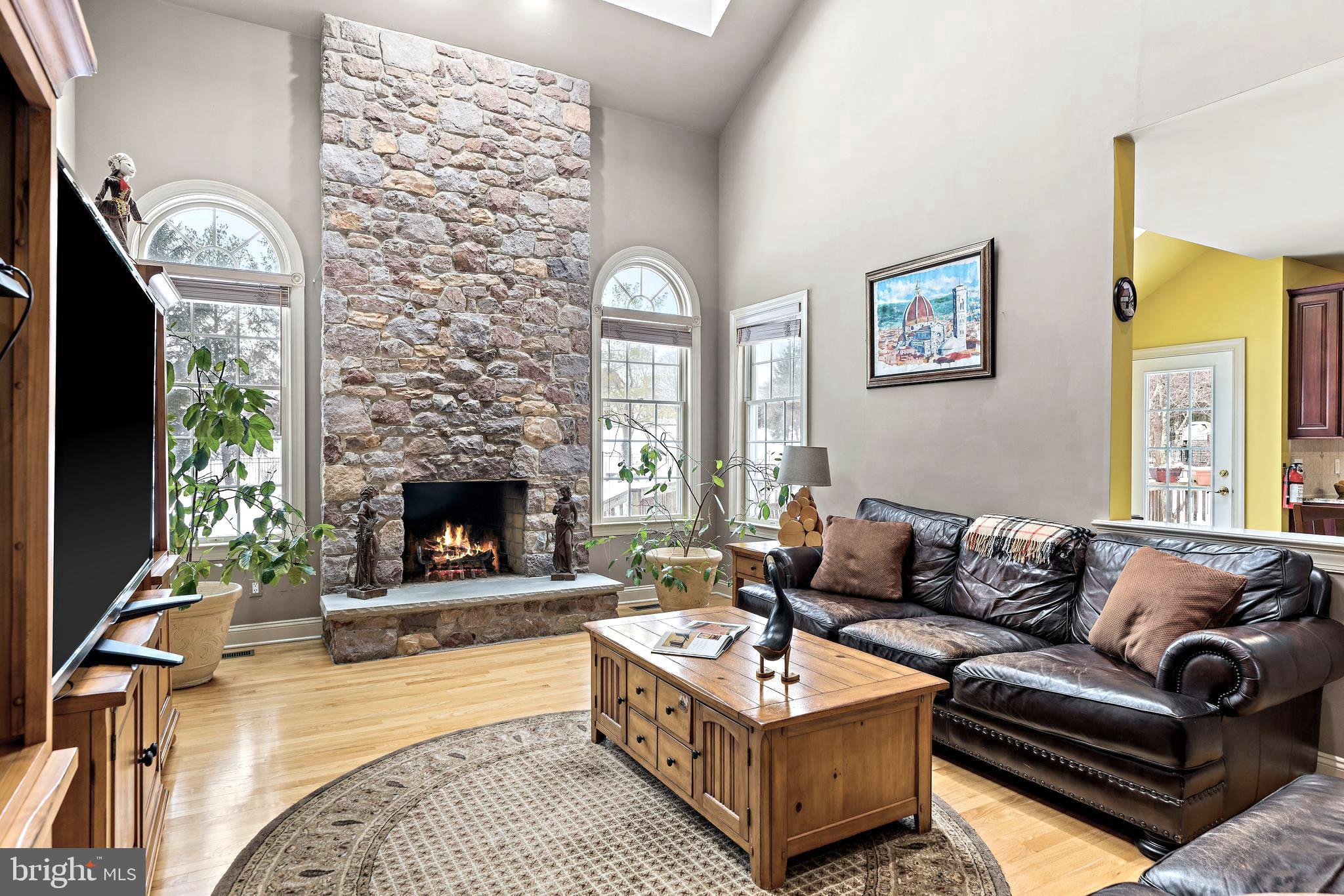 205 Christopher Drive Princeton, NJ 08540 - Photo 3 of 45 Stone fireplace in Family Room.