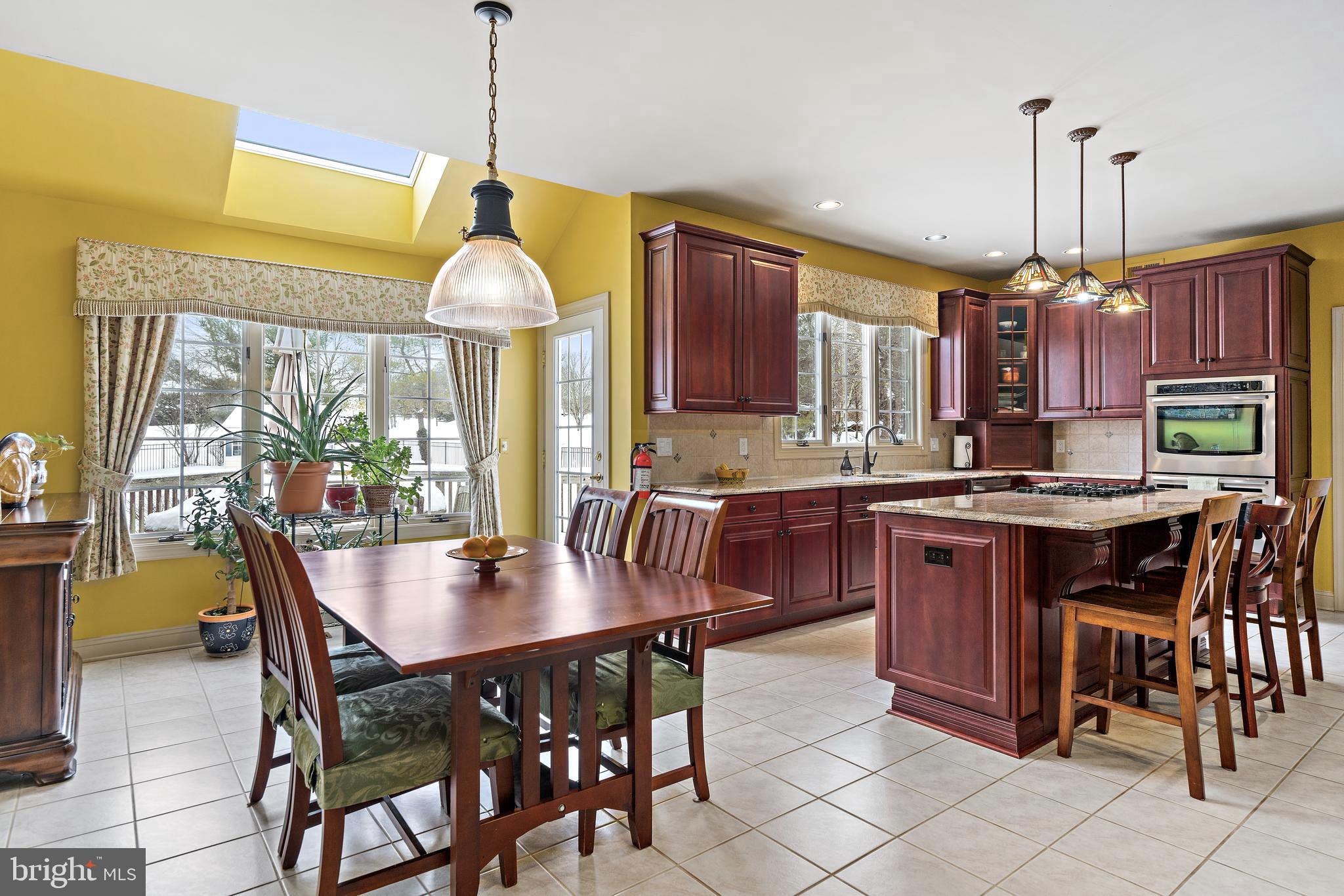 205 Christopher Drive Princeton, NJ 08540 - Photo 4 of 45 Breakfast Room with Kitchen-door to deck.