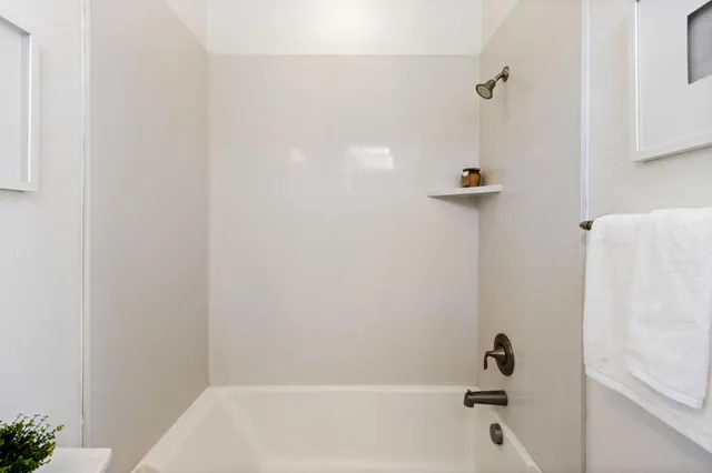 a bathroom with a bathtub