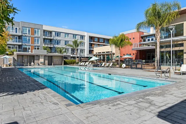 a view of a gym with wooden floor