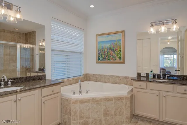 a bath room with a sink and a mirror