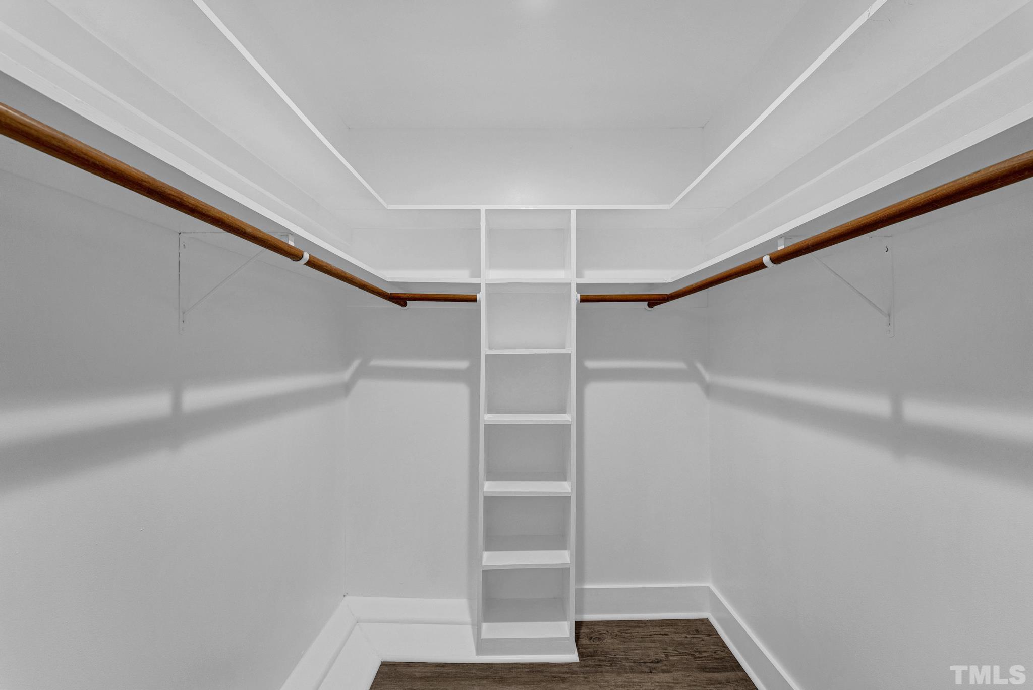 6712 Millbridge Court Raleigh, NC 27615 - Photo 18 of 25 a view of an empty walk in closet