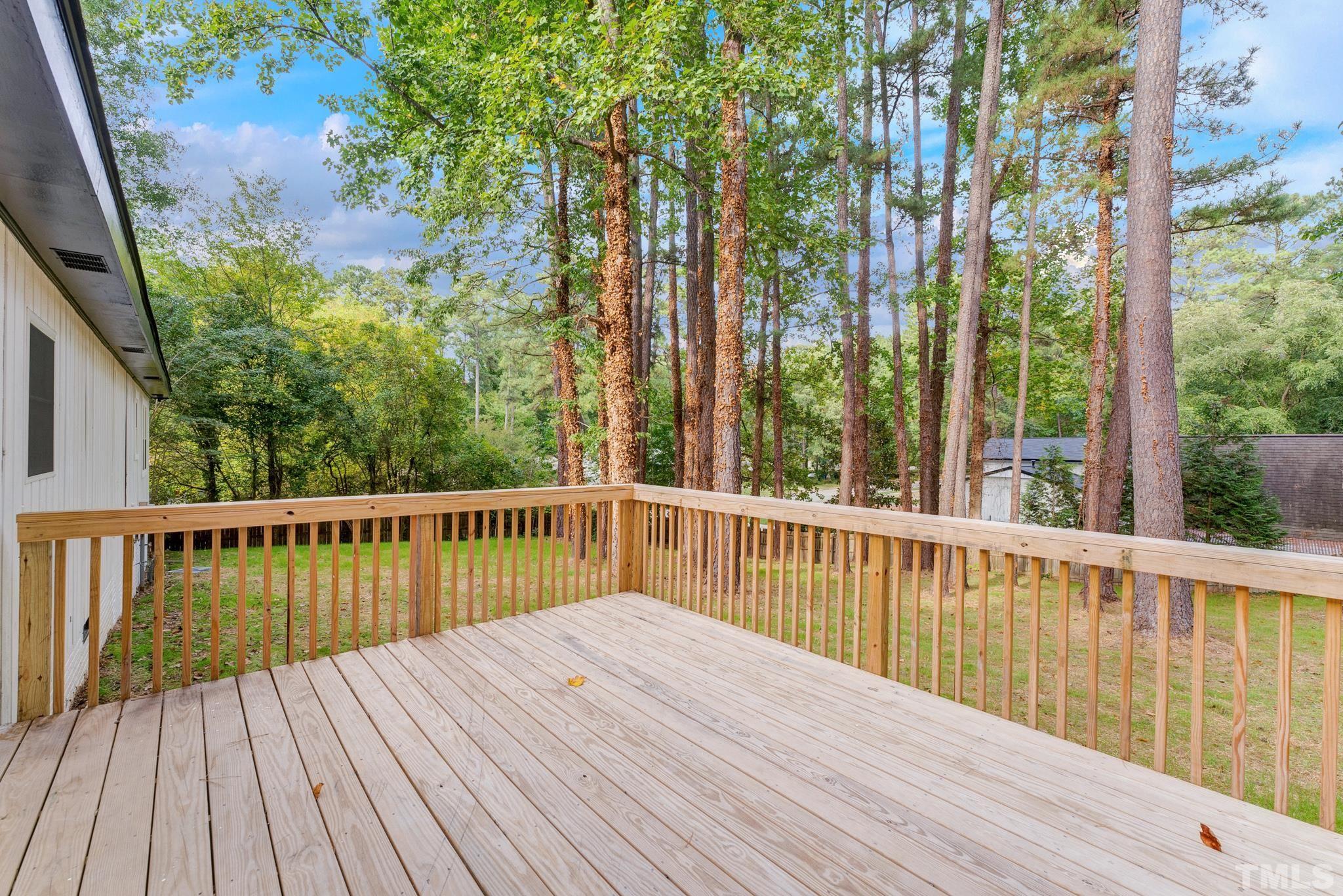 6712 Millbridge Court Raleigh, NC 27615 - Photo 23 of 25 a view of balcony with wooden floor