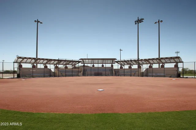 a view of swimming pool with outdoor seating
